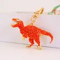 Sparkling orange rhinestone dinosaur keychain charm with elegant gold-plated metal finish - Individual OPP Bag Packaging / Orange