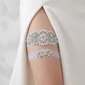 Elegant bridal garter set with rhinestone pearl flowers and light blue lace trim. - Flower Rhinestone Artificial Pearl 2-Piece Set (GS-J031S)