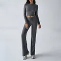 Two-piece dark grey yoga set featuring a long sleeve crop top and drawstring pants. - S / Dark Gray