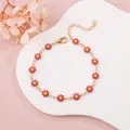 Elegant gold-tone chain bracelet with pink and yellow enamel daisy flower charms - Rose Red Daisy (Gold Tone)