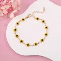 Delicate gold-tone bracelet featuring vibrant yellow sunflower charms for women - Yellow Daisy with Black Center (Gold Tone)