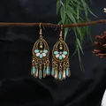 Vintage bohemian style ethnic oval drop earrings with blue and pink tassel fringe detail. - Blue Pink Oval Tassel Style (E8775)