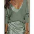 Elegant two-piece set featuring a sage green v-neck knit sweater over a satin slip dress - Pea Green Sweater / XS