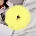Vibrant yellow plush oversized scrunchie hair tie for stylish autumn and winter looks - Bright yellow