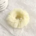 Elegant large plush hair scrunchie in cream white color for soft autumn and winter style - Beige