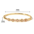 Eleganter vergoldeter Armreif mit funkelnden Zirkonia-Blumen, 5,8 cm Durchmesser. - Typ A Goldfarben