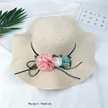 Foldable beige straw sun hat for women featuring a wavy brim and pastel fabric flowers - M (56-58cm) / Beige