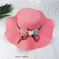 Elegant pink foldable straw sun hat with decorative floral accents for summer travel - M (56-58cm) / Pink