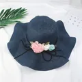 Navy blue wide brim foldable straw sun hat for women with floral decor and adjustable black tie. - M (56-58cm) / Navy Blue