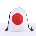 White drawstring backpack with large red circle for sports fans and outdoor events - Japan
