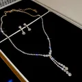 Elegant rhinestone jewelry set featuring water drop tassel earrings and matching necklace - Basic Necklace Earring Set