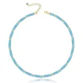 Macro view of a light blue natural stone beaded necklace with gold-toned spacers - Aquamarine Heishi Necklace