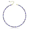 Detailed close-up of a blue natural stone bead necklace with golden spacer beads - Blue Veined Stone Heishi Necklace
