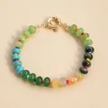 Macro view of a vibrant candy-colored natural stone beaded bracelet with gold clasp - Deep Blue Green (N4B945-10)