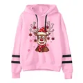 Felpa con cappuccio rosa natalizia da donna con renna dei cartoni e fiocchi di neve - S / Rosa