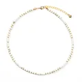 White marble disc beaded necklace featuring gold spacers and a heart charm extender - White Turquoise Abacus Bead Style
