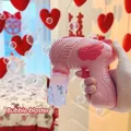 Pink wing-shaped handheld automatic bubble machine toy with bubble solution bottle - Wedding Small Angel Wings Red