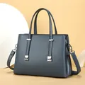 Elegant dusty blue leather handbag for women featuring metallic hardware and shoulder strap - 30*13*21cm / Blue