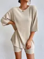 Conjunto de dos piezas para mujer en punto acanalado beige con camiseta y pantalones - S / Albaricoque
