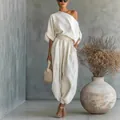 Elegante conjunto de dos piezas de lino con top sin hombros y pantalones de linterna - S / Blanco Roto