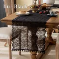 Elegant black French lace table runner with intricate hollow-out floral patterns for home decor - Ilo Black