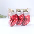 Set of glossy red and white polka dot Christmas stocking ornaments in a clear box - Red Shoe