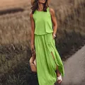 Levendige limoengroene mouwloze maxi-jurk met ronde hals en zijsplit voor zomer. - S / Dresses / Lichtgroen