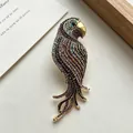 Vintage parrot brooch with colorful rhinestones and gold-tone finish for women - Purple