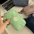 Stylish mint green nylon triple zipper pouch with wrist strap for smartphones and coins - Large / Mint Green