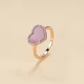 Rose gold heart ring with pink shell inlay and pavé stones on beige background. - DSR00341 Pink Shell Ring
