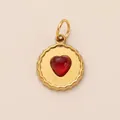 Gold plated stainless steel biscuit shape pendant with a central red heart gemstone - Round Red Heart Pendant