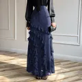 Elegant navy blue polka dot ruffle maxi skirt for a stylish casual holiday look - S / Navy Blue
