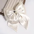 Elegant cream satin bow hair clip with pearl and gemstone details - Beige