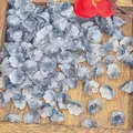 Close-up of blue 7x12mm lily of the valley glass beads for DIY jewelry in a wooden box - Lily of the Valley 38# Black 7x12mm