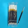 Detailed close-up view of bulk black gel pen refills in transparent plastic bag packaging. - 20 Refills Pack / Blue