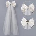 Elegant white satin bridal bow veil with pearl BRIDE lettering and long tulle. - BRIDE Pearl Letters Satin Bow (HS-J7461)