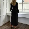 Élégante robe longue noire à manches longues pour femme avec une coupe flatteuse au dos. - S / Noir