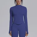 Front detail of seamless royal blue zip-up yoga jacket featuring a sleek stand collar - Navy Blue