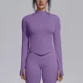 Front detail view of a seamless purple athletic zip-up jacket for women's fitness - Mist Purple