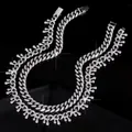Close-up detail of iced out dripping thorn Cuban link chain in brilliant silver finish - 008 Necklace + 496 Necklace (50cm) / Silver