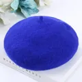 Close-up detail of a vintage royal blue wool beret hat showing premium wool texture - One Size / Sapphire Blue