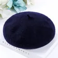 Classic navy blue wool beret hat for women featuring a warm vintage winter style design - One Size / Navy Blue