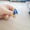 Elegant blue enamel sailboat brooch with sparkling rhinestones in a gold-tone finish - XZ164 Dark Blue