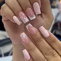 Elegant handmade pink press-on nails with white 3D floral designs and French tips - 2XG3-14078 (Pink White Relief Flower French Glitter)