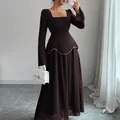 Elegant long-sleeved evening maxi dress in dark brown featuring white pearl accents - S / Dark Brown