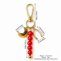 Portachiavi vintage in lega d'oro con perline rosse e luna per borse e accessori - Stile Luna Crescente Perla Rossa (XCBS261215R)