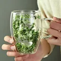 Elegant insulated double-walled borosilicate glass cup with green dried flowers inside - 350ml / The Wizard of Oz Green