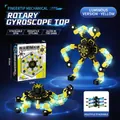 Transformable luminous mechanical fingertip gyro spinner toy in yellow - Luminous Yellow (Chinese Box)