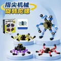 Set of 4 colorful mechanical deformable fingertip spinning tops for stress relief - 4-Color Mixed Set (Regular, Chinese Box)