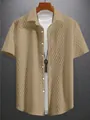 Khakifarbene Herren-Strickshirt mit Kurzarm, Jacquard-Muster und Reverskragen - S / Khaki